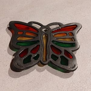 Add color to your table setting  beautiful Cast Iron Butterfly Footed trivet